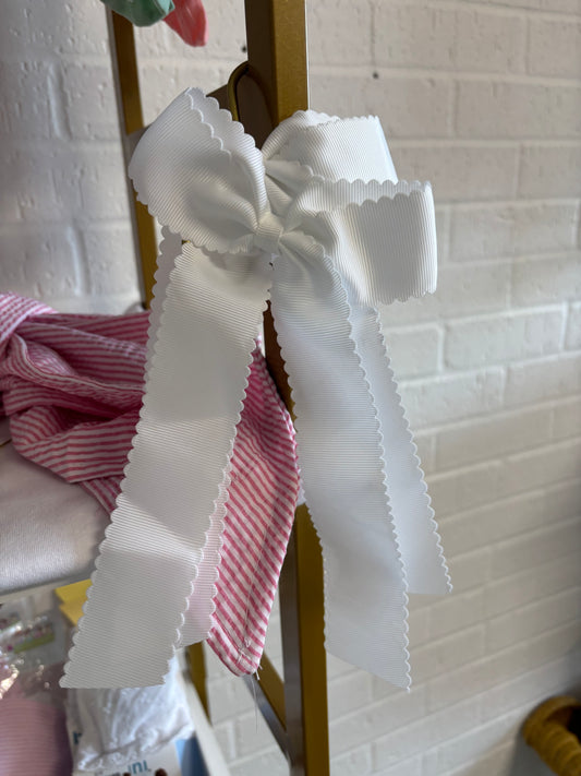 White ribbon bow