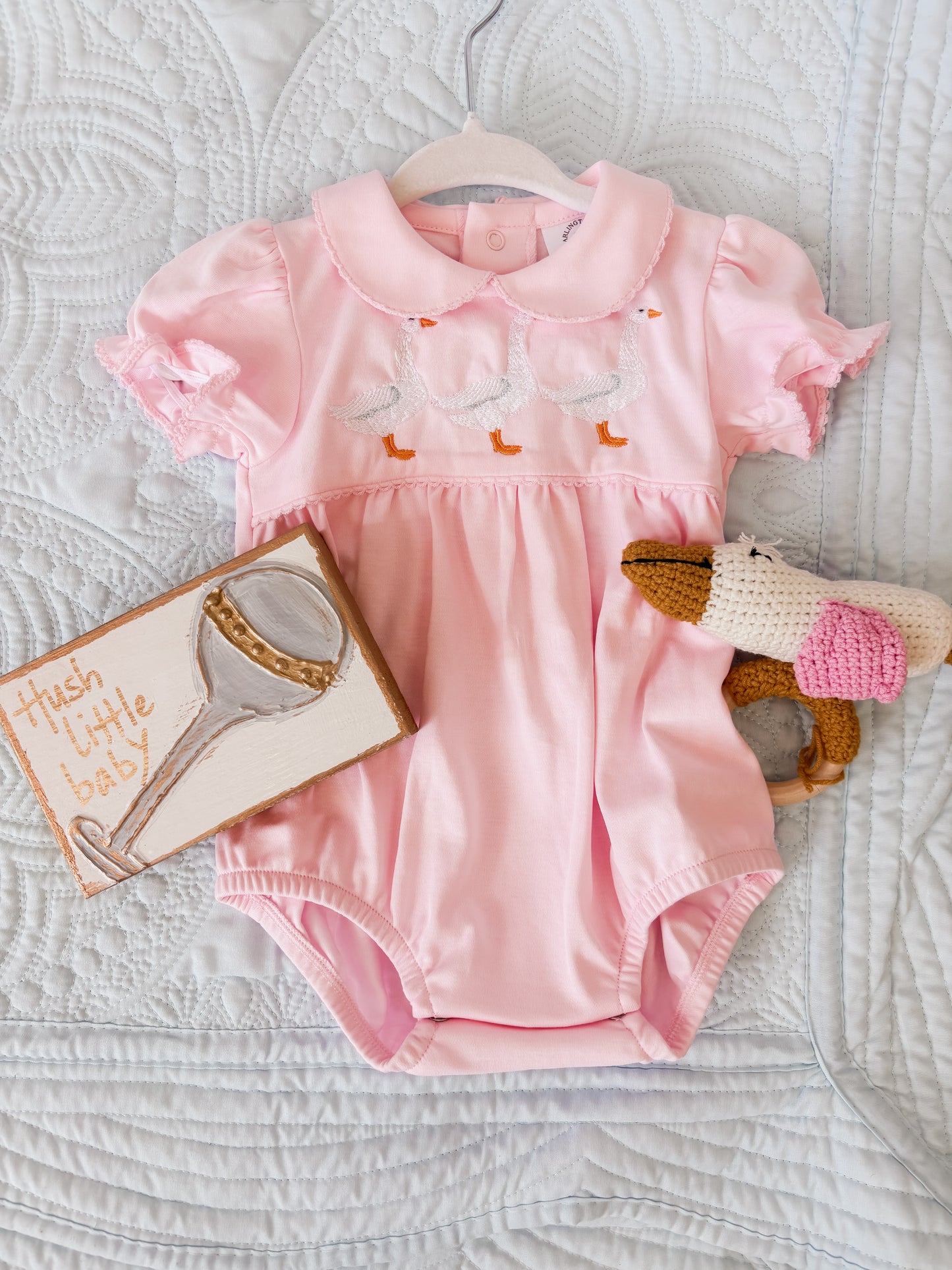 Pink pelican rattle